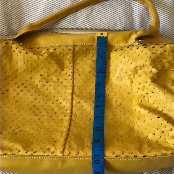 Genuine Leather Soft Yellow Purse holepunch design - Picture 7 of 9